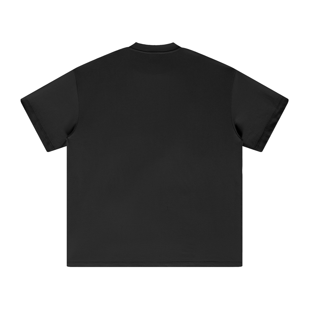 Back view of black boxy cotton t shirt, plain back with clean streetwear silhouette
