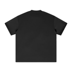 Back view of black boxy cotton t shirt, plain back with clean streetwear silhouette